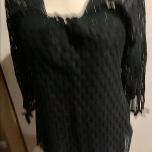 Black lace lined top with long sleeves.